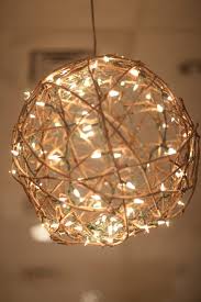 Make Grapevine Balls For A Lovely Home Decoration Craft Projects For Hanging Christmas Lights Christmas Light Installation Decorating With Christmas Lights