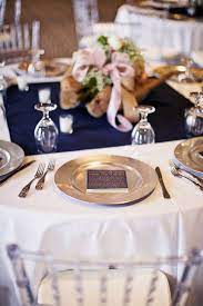 Maybe you would like to learn more about one of these? Wedding Reception Table Design Blush Navy Color Scheme Using Driftwood As A Centerpiece Wi Wedding Reception Tables Reception Table Design Blue Themed Wedding