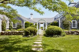 Models in this collection are often tailored to a sloping lot and many include an attached garage. Tour A New York Couple S Classic Martha S Vineyard Home Architectural Digest