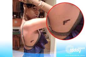 Arabic tattoo design is represented by arabic calligraphic and also some old tribal pattern like persian or some middle east style motives. Rihanna Tattoos Photos And Explanation