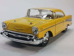 • classic 1950s models — including the 1955 pontiac starchief convertible, 1955 mercury montclair hardtop, 1957 chevrolet bel air hardtop, 1957 lincoln continental mark ii, 1958 ford edsel sedan, and 1959 buick electra 225 convertible• powerful muscle. Amazon Com Kinsmart Canary Yellow 1957 Chevy Bel Air 2 Door Coupe 1 40 Scale Diecast Car By Kinsmart Toys Games