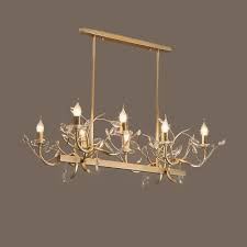 Large selection of indoor lighting lights & in united states, russia, united kingdom, india, germany, ukraine, australia, canada, france, sweden, italy, netherlands, poland, indonesia, malaysia, philippines, spain, brazil, thailand, turkey, romania, singapore, greece, south korea, hungary. Traditional Linear Island Lighting With Candle 8 Heads Champagne Gold Pendant Lamp With Clear Crystal Accents Beautifulhalo Com