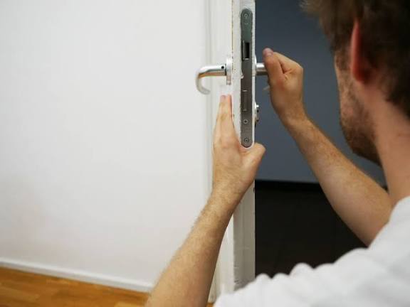 SwiftLatch Locksmith technician working in Lehi