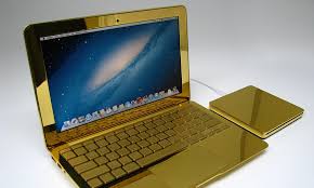 Fu la prima infatti a lanciare sul mercato il macintosh, ovvero il primo computer dotato di interfaccia grafica e mouse. The Ultimate Midas Touch The 24 Carat Gold Macbook Pros Complete With Diamond Apple Logos A Snip At 30 000 Daily Mail Online