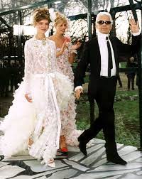 Karl Lagerfeld S Muses See Every Model Who S Worn The Iconic Chanel Wedding Dress On The Runway Chanel Wedding Dress Chanel Wedding Wedding Dresses