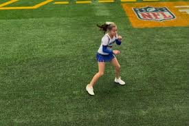 Teen cheerleader in Texas goes viral for her sideline shadowboxing —  because she's also a national champ boxer