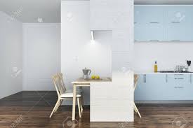 Maybe you would like to learn more about one of these? White Kitchen Interior With A Dark Wooden Floor And Blue Countertops A White Table With Wooden Chairs 3d Rendering Mock Up Stock Photo Picture And Royalty Free Image Image 95657421