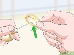 What people usually refer to as fake gold is jewelry that is made of another metal (such as nickel, copper, silver, etc.) and covered with a layer of gold (gold. 3 Ways To Test Gold At Home Wikihow