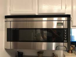 During microwaving, steam may come from. Sharp 1 5 Cu Ft 1000w Over The Range Microwave Oven With Concealed Control Panel In Stainless Steel Walmart Com Walmart Com