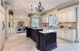 Floor cabinets have recessed bases and countertops in greys the counters are fitted with a granite top surface, which gives the kitchen a modern twist. 30 Antique White Kitchen Cabinets Design Photos Designing Idea