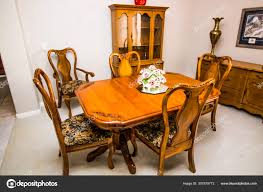 dining room wooden table, chairs and