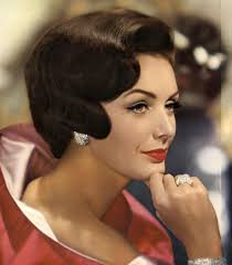 Lucinda Hollingsworth in Revlon hair color ad, with jewelry by Van Cleef &  Arpels, 1960.