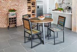 The reclaimed wood dining table only uses original reclaimed materials, not new wood made to look old. Urban Chic Round Dining Table 100cm Reclaimed Wood Dining Tables