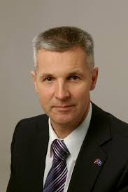 Scammers use photos of Latvian 'silver fox' to con Manchester mum