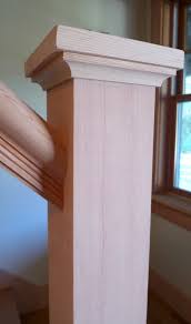 A newel post can be mounted directly to the wooden stairs by securing it with nails to the side of the stair boards without having to mount it to the concrete. Building A Housed Newel Thisiscarpentry