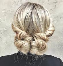 Once you've created one loop, knot the rest of the hair through the bun and secure it, leaving the rest of the ponytail long and loose. 40 Updos For Long Hair Easy And Cute Updos For 2021