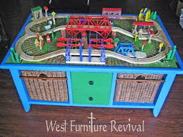 Make A Train Table From A Coffee Table Diy West Furniture Revival Genius Train Table Toy Train Table Toy Rooms