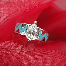 A Southwestern Twist On An Engagement Ring We Used Colors From Our Client S Favorit Turquoise Wedding Rings Turquoise Ring Engagement Turquoise Stone Jewelry
