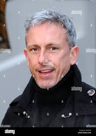Patrick cox arrives at the burberry fashion show in london hi-res stock  photography and images