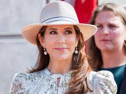 Queen Mary models cinched skirt following mystery injury