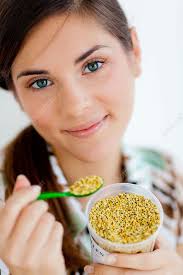 Woman eating pollen