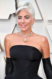 Music video by lady gaga performing diamond heart. The Story Behind Lady Gaga S 128 Carat Yellow Diamond Oscars Necklace Another