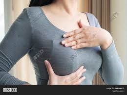 New lump in the breast or underarm (armpit). Woman Hand Checking Image Photo Free Trial Bigstock