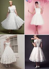 It features an illusion neckline and cap sleeves. 50s Wedding Dress Wedding Dresses Vintage Wedding Dress