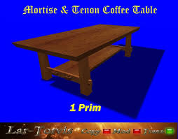 It is an oval cocktail table that has got a solid hardwood construction, cherry veneer and cinnamon finish. Second Life Marketplace Mortise Tenon Coffee Table