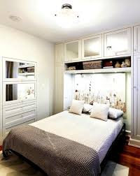 When going for a modern look, use small pillows in bold colors. Small Master Bedroom Ideas With Storage Wall Design Ideas