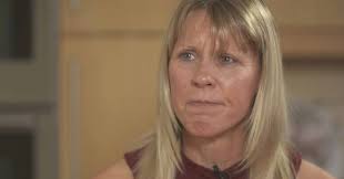 The widow of a Cardiff University lecturer who died by suicide has demanded  action over workload pressures