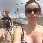 Coco & Charlie Children's Store. retail window display. First birthday  party window display. Bunting. Paper Garland.