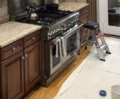 Stain and paint decks patios. Can I Paint Over Stained Wood Williams Painting