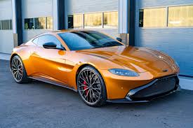 Image result for Satin Golden Saffron 2022 Aston Martin