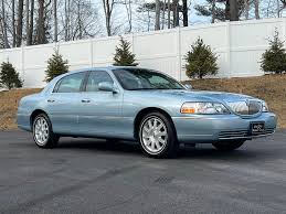 Image result for Light Ice Blue 2007 Town Car