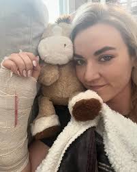 🎉🏥 Surgery Debut Alert! 🏥🎉 Swipe left to see me rocking the ultra-chic  hospital gown and giving my best “I'm slightly nervous but also ready for  my post-op ice cream” smile. 😅🍦