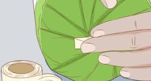 I'm late to the game here, but maybe this will help those of you who are having trouble attaching vinyl to candles. 4 Ways To Wrap A Present Wikihow