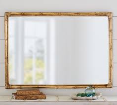 This incredible end table has three drawers for roomy hidden storage. Bamboo Gold Accent Wall Mirror Pottery Barn