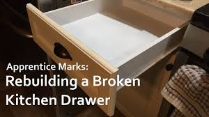 Look through the gap of the oven drawer and slide the spatula or ruler down into the drawer. Rebuilding A Broken Kitchen Drawer Youtube