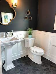 Wainscoting is installing wooden trim and panels in a pattern along the wall. Modern Home Trends I M Loving Small Bathroom Bathrooms Remodel Bathroom Makeover