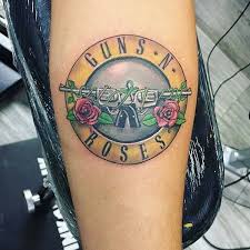 Post a photo of your @gunsnroses tattoo! Pin On Art