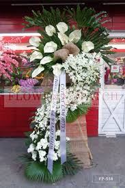 He was very young and dear to our hearts. Standing Arrangement Of White Anthuriums Orchids Malaysian Mums Sympathy Funeral Flowers Flower Patch Online Flower Delivery Phillippines