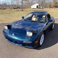 Image result for Canard Blue 1967 Mazda