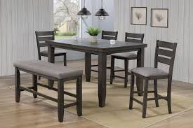 The extra height opens up the area beneath the table giving the room a feeling of space. Bardstown Counter Height Table 4 Chairs And Bench Gray 2752 Cm T 4 B Gy Dining Room Groups Price Busters Furniture