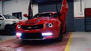 Check out the video by supercarsinbangalore. Chevrolet Cruze Modified Into Red Camaro Motormind Scissor Door Autobics