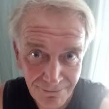 must be the broads water .an orange sheep at Cantley