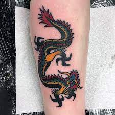 50 Small Dragon Tattoo Ideas For Men 2021 Inspiration Guide Chinese Dragon Tattoo Dragon Tattoo Tattoo Ideas For Men Leg