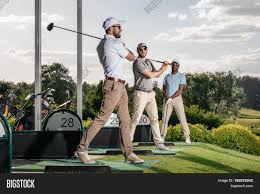 Golf is a sports game in which individual participants or teams try to hit a small ball into special holes let's start the review of golf equipment with clubs. Group Golf Players Image Photo Free Trial Bigstock