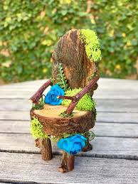 These Gorgeous Handmade Fairy Chairs Are Crafted From Bark Twigs Moss And Paper Flowers Each Ch Fairy Garden Designs Fairy Garden Diy Fairy Garden Furniture