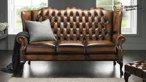 Simply put, a chesterfield sofa is a large couch with rolled arms that are the same height as the back. Gold Chesterfield High Back Sofa Designer Sofas 4u Youtube